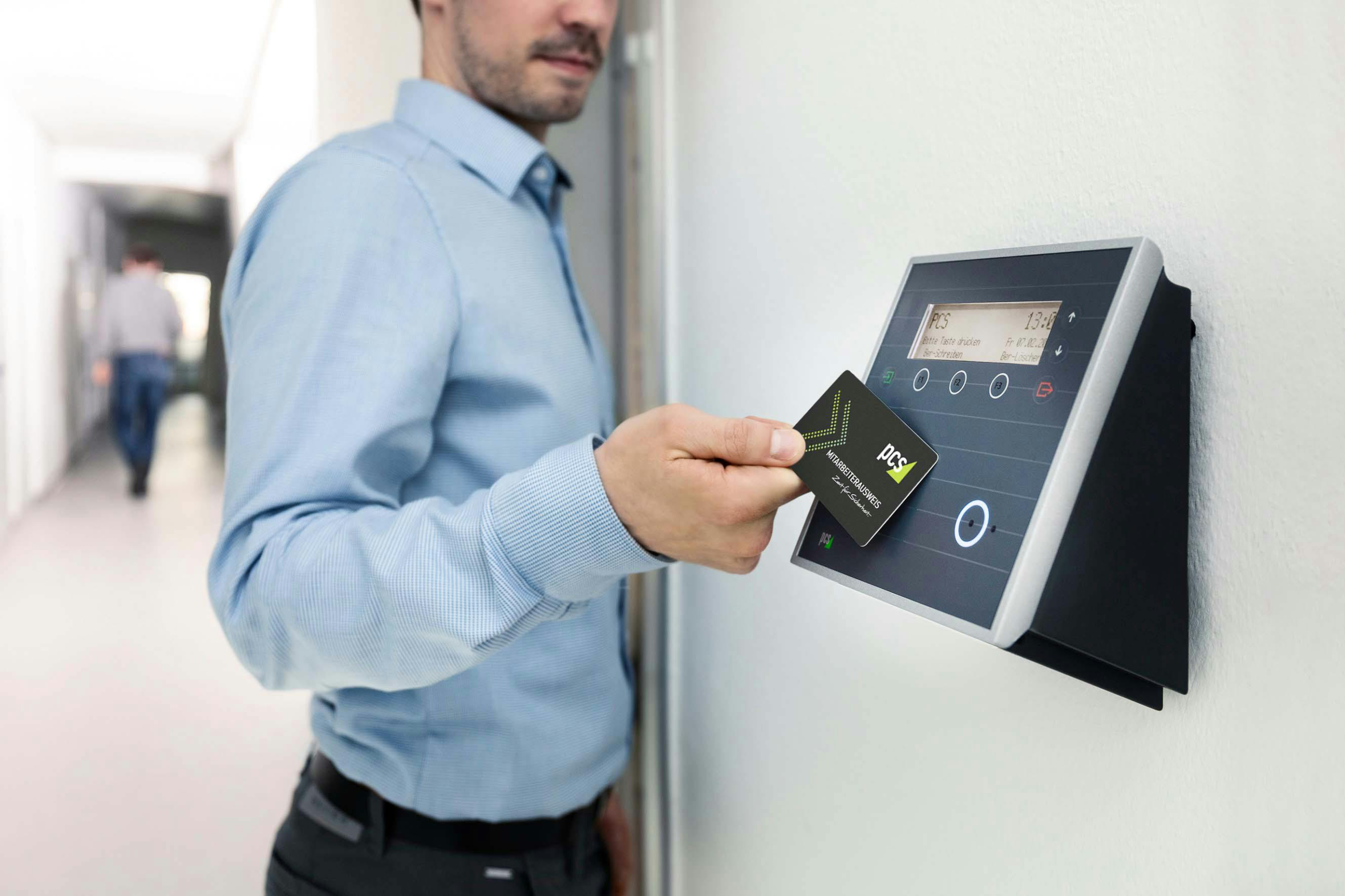A person using a smart card for door access