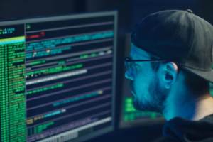 A person looking at data on a computer
