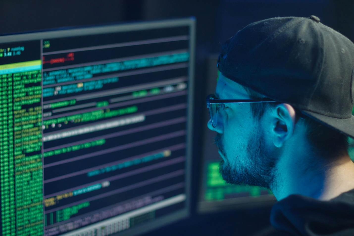 A person looking at data on a computer